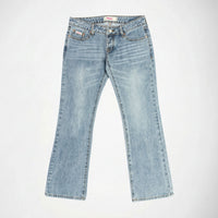 Light wash blue denim Bubblegum jeans with the Jane super low rise, flare leg fit, laid flat on a light gray background.
