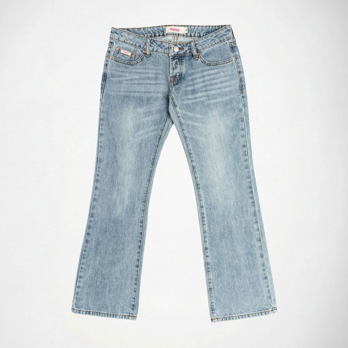 Light wash blue denim Bubblegum jeans with the Jane super low rise, flare leg fit, laid flat on a light gray background.