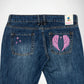 Back view of a pair of indigo denim, Bubblegum jeans featuring pink embroidered designs on the back pockets, including a pair of angel wings and shining  star on the right pocket, and three stars on the left pocket. A brand Bubblegum USA label is visible on the back waistband.
