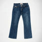 A pair of medium-wash blue Bubblegum denim jeans with a Jane super low flare fit, laid flat against a light gray background.