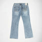 Light wash blue denim Bubblegum jeans shown from the back, featuring star stud embellishments on the back pockets and a small colorful Bubblegum brand patch at the waistband, photographed on a clean white background.