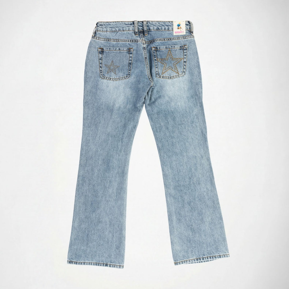 Light wash blue denim Bubblegum jeans shown from the back, featuring star stud embellishments on the back pockets and a small colorful Bubblegum brand patch at the waistband, photographed on a clean white background.