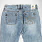 Back view of light-wash blue Bubblegum jeans featuring large star-shaped embellishments on both back pockets, with a visible Bubblegum USA brand label at the waistband.