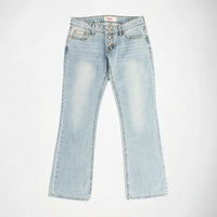 Light wash blue denim Bubblegum jeans with a super low rise, flare leg, with exposed botton fly, laid flat against a white background.