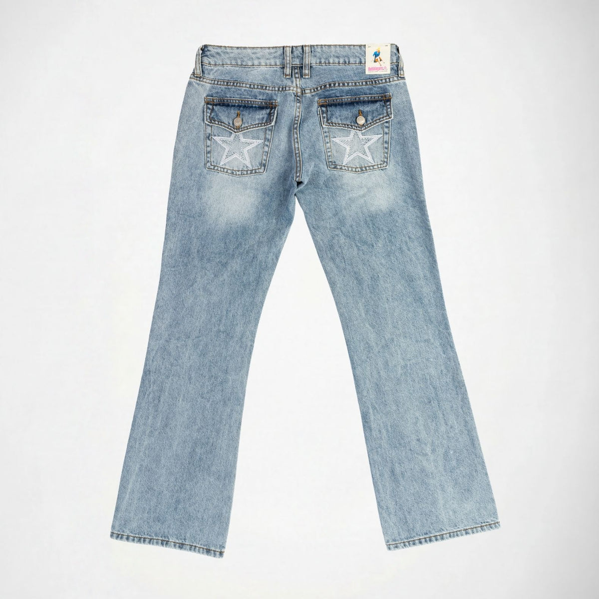 Light blue denim Bubblegum jeans shown from the back, featuring a star embroidery with rhinestones on each pocket and a small colorful Bubblegum USA brand label at the back waistband, photographed on a clean white background.