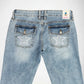Back view of light blue denim Bubblegum jeans featuring embroidered white star-shaped with rhinestones on both back pockets, shown against a plain white background.