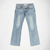 Light blue denim Bubblegum jeans with a super low rise, flare leg, featuring light wash fading on the thighs and a visible Bubblegum USA logo patch on the front right pocket, laid flat against a white background.