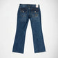 Back view of a pair of blue denim Bubblegum jeans with a star embellishment on the right back pocket, displayed against a plain white background.