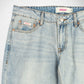 Close-up of a pair of light-wash blue denim Bubblegum jeans showing the waistband, front button closure, belt loops, pocket details, and a visible Bubblegum USA brand label.