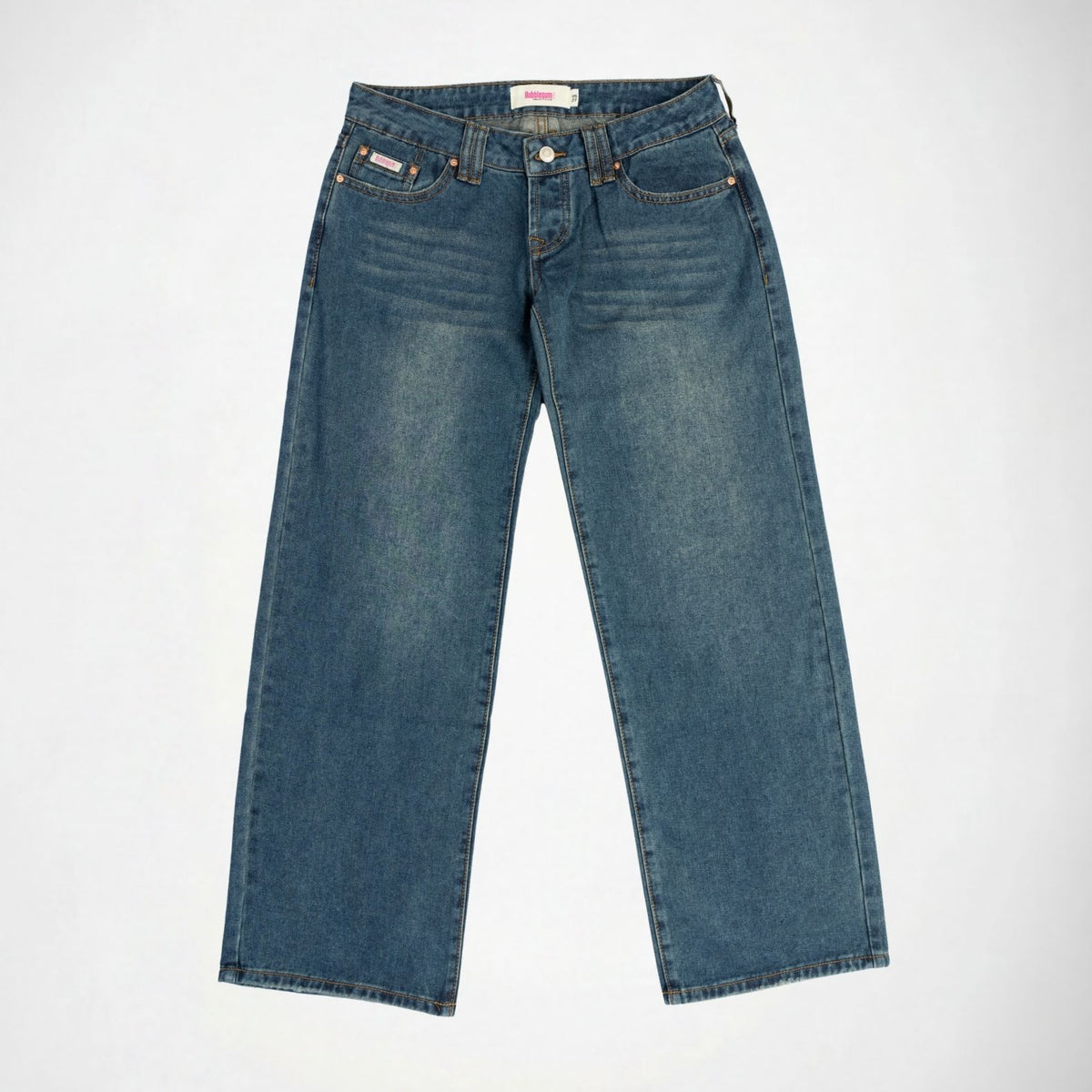 A pair of medium wash blue denim Bubblegum jeans laid flat against a light gray background.