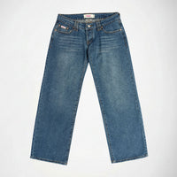 A pair of medium wash blue denim Bubblegum jeans laid flat against a light gray background.