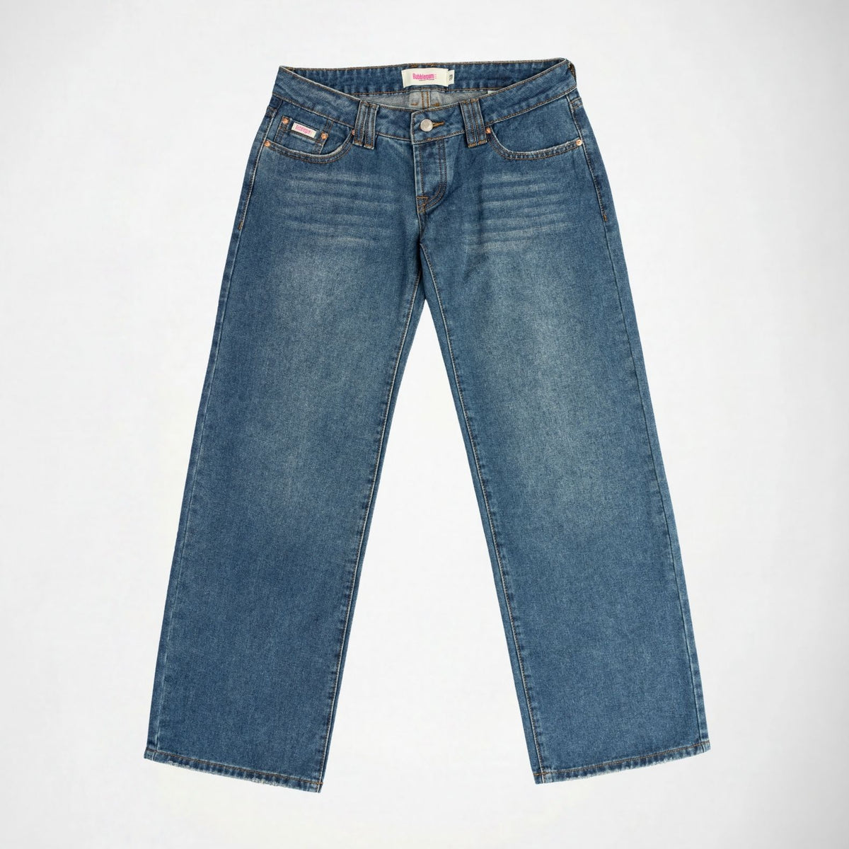 A pair of medium wash blue denim Bubblegum jeans laid flat against a light gray background.
