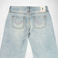 Back view of light-wash blue Bubblegum jeans featuring embroidered love wings with rhinestones on both back pockets and a Bubblegum USA brand patch on the waistband.