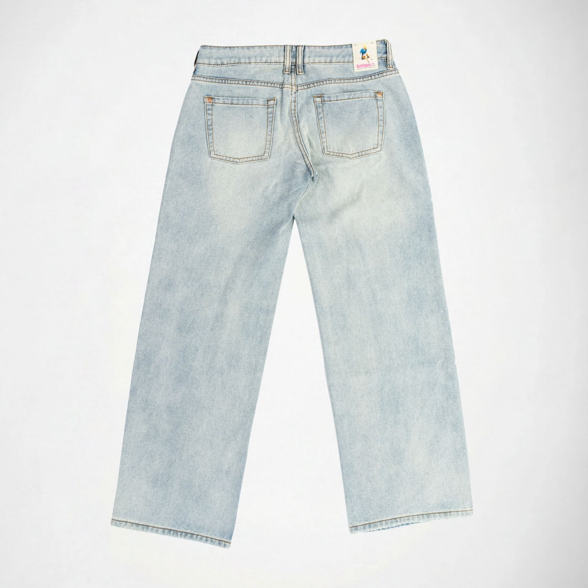 Back view of light-wash blue denim Bubblegum jeans with a super low rise, wide leg fit, laid flat on a white background.