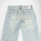 Back view of light-wash blue denim Bubblegum jeans showing the waistband, belt loops, and back pockets on a white background.