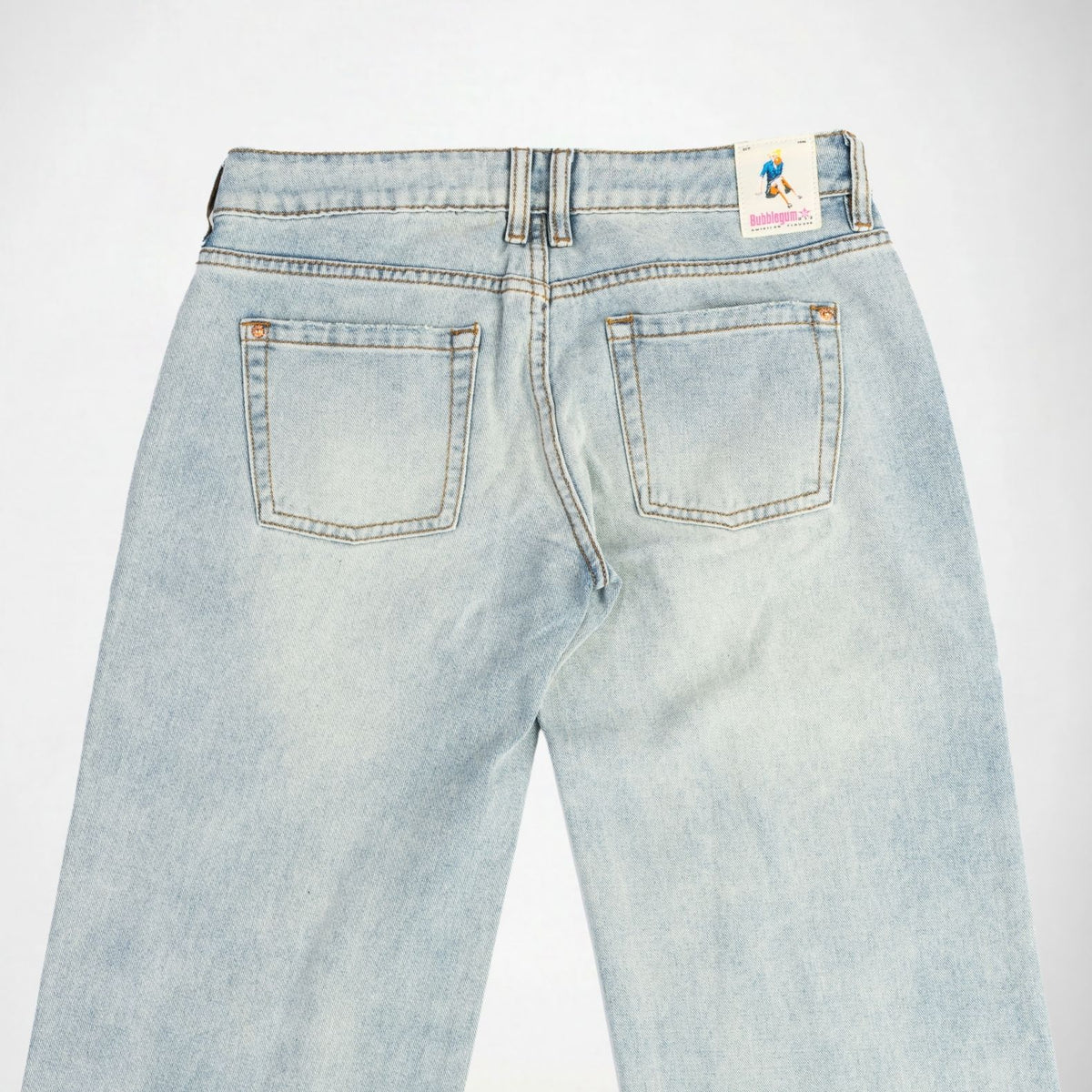 Back view of light-wash blue denim Bubblegum jeans showing the waistband, belt loops, and back pockets on a white background.