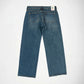 A pair of blue denim Bubblegum jeans shown from the back, laid flat on a light gray background. The back pockets are clearly visible, along with a Bubblegum USA brand label stitched to the back waistband.