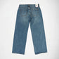 Back view of a pair of blue denim Bubblegum jeans with a super low rise fit, wide leg laid flat on a white background. The back pockets are clearly visible, along with Bubblegum USA brand label on the waistband.